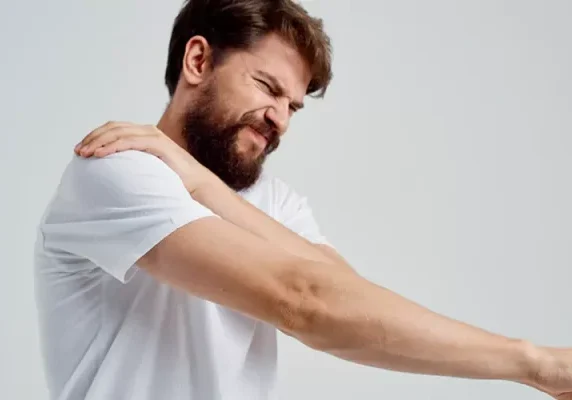 shoulder-impingement guy holding shoulder Shoulder Impingement